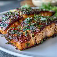 Healthy sheet pan salmon with green beans and potatoes, roasted to perfection with lemon and herbs for a bright, balanced dinner.  